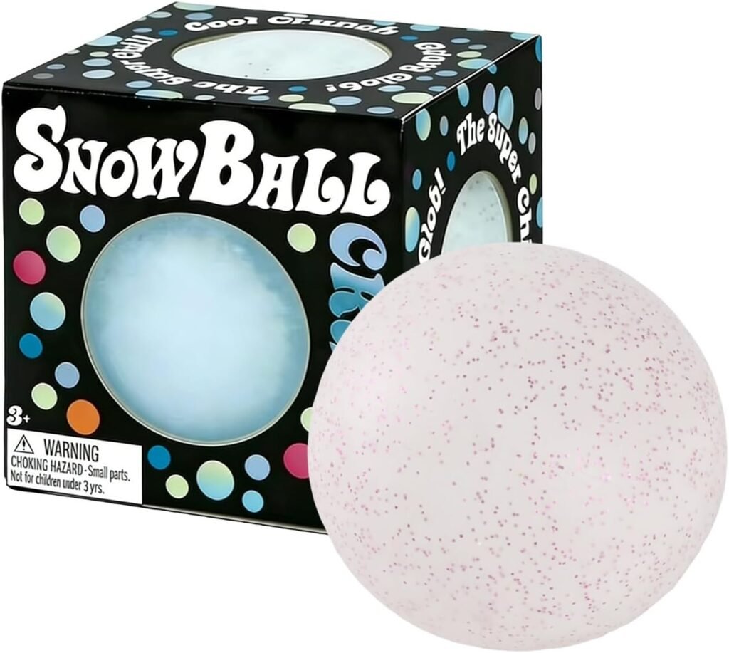 A pink NeeDoh Snowball squish toy resting on a clean desk, ready for a squeeze — Image 1 of 6
