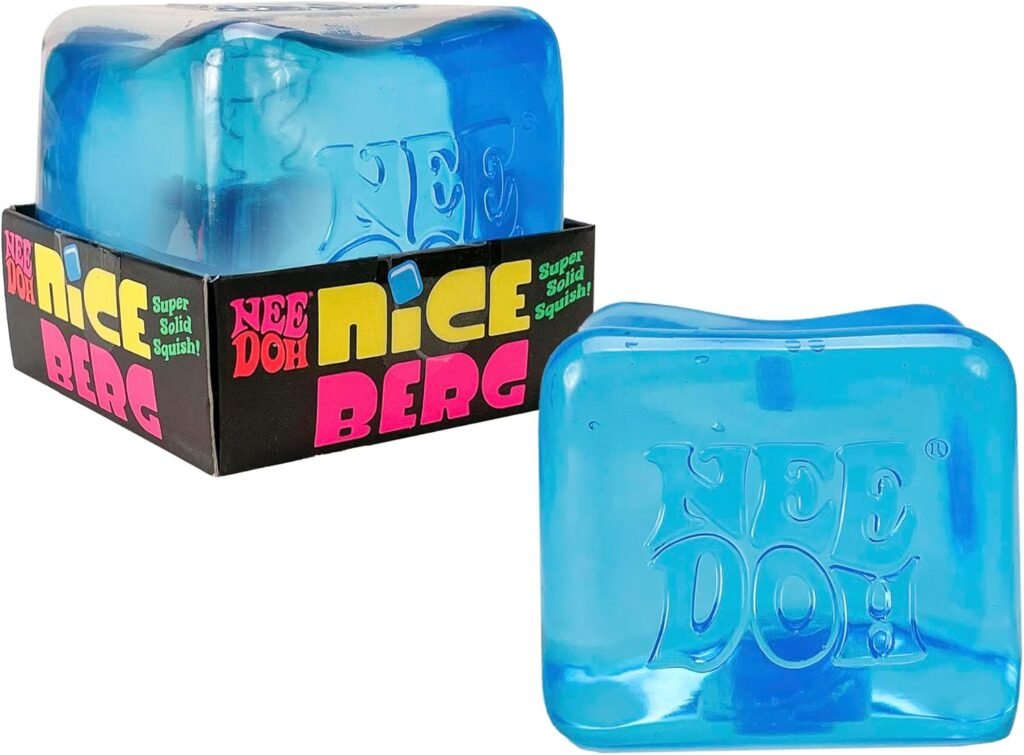 Oversized NeeDoh Nice Berg squish cube in translucent iceberg blue, with smooth glossy sides and a chunky square shape — Image 1 of 8